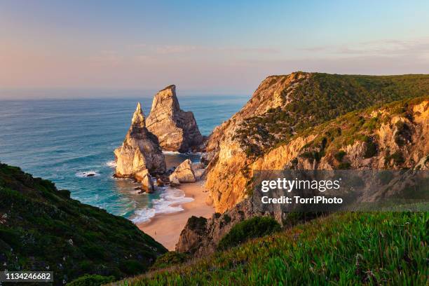 ursa beach during sunset. praia da ursa, portugal - シントラ ストックフォトと画像