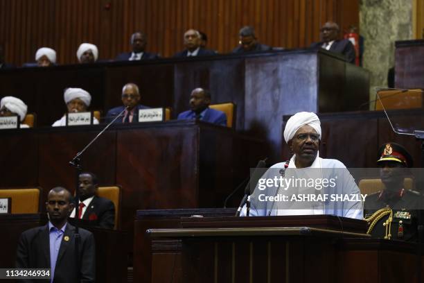 Sudanese President Omar al-Bashir addresses parliament in the capital Khartoum on April 1, 2019 in his first such speech since he imposed a state of...