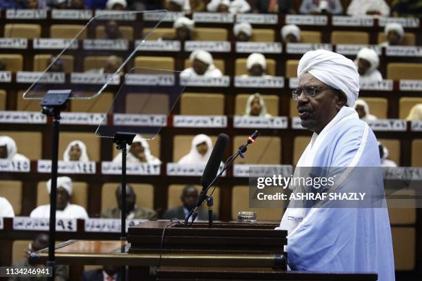 Sudanese President Omar al-Bashir addresses parliament in the capital Khartoum on April 1, 2019 in his first such speech since he imposed a state of...