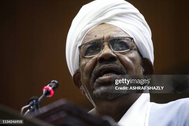 Sudanese President Omar al-Bashir addresses parliament in the capital Khartoum on April 1, 2019 in his first such speech since he imposed a state of...