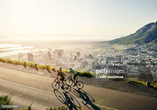 it’s all about the journey - cyclist mountain stock pictures, royalty-free photos & images