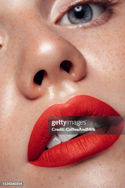 women's face. perfect skin with freckles, soft make-up. young beautiful woman. - woman lipstick stock pictures, royalty-free photos & images