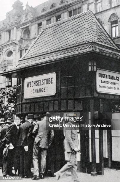 Hyperinflation in Weimar Germany 1923. Boxes of banknotes are transported to pay for groceries in Berlin as the value of the German Reichsmark...