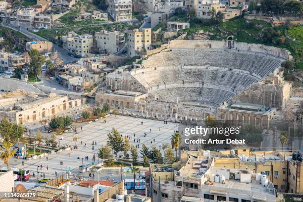 discovering the beautiful roman theater of the amman city. - amman people stock pictures, royalty-free photos & images