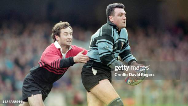 Toulouse player Christophe Deylaud tackles Cardiff player Mark Ring during the 1996 Heineken Cup Final between Cardiff and Toulouse at Cardiff Arms...