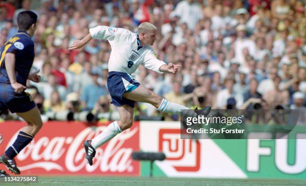 England player Paul Gascoigne shoots to score the second England goal during the 1996 European Championships Group match against Scotland at Wembley...