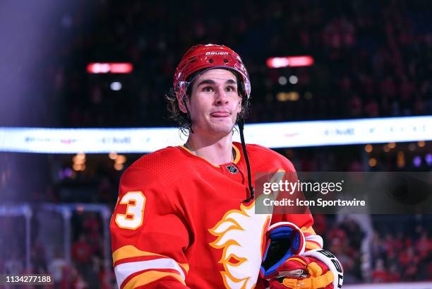 Calgary Flames Center Sean Monahan gets ready to throw a hat into the crowd after being named the first star of an NHL game where the Calgary Flames...