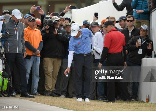 Kevin Kisner takes a drop off the cart path on the sixth hole during the championship match at the World Golf Championships-Dell Technologies Match...