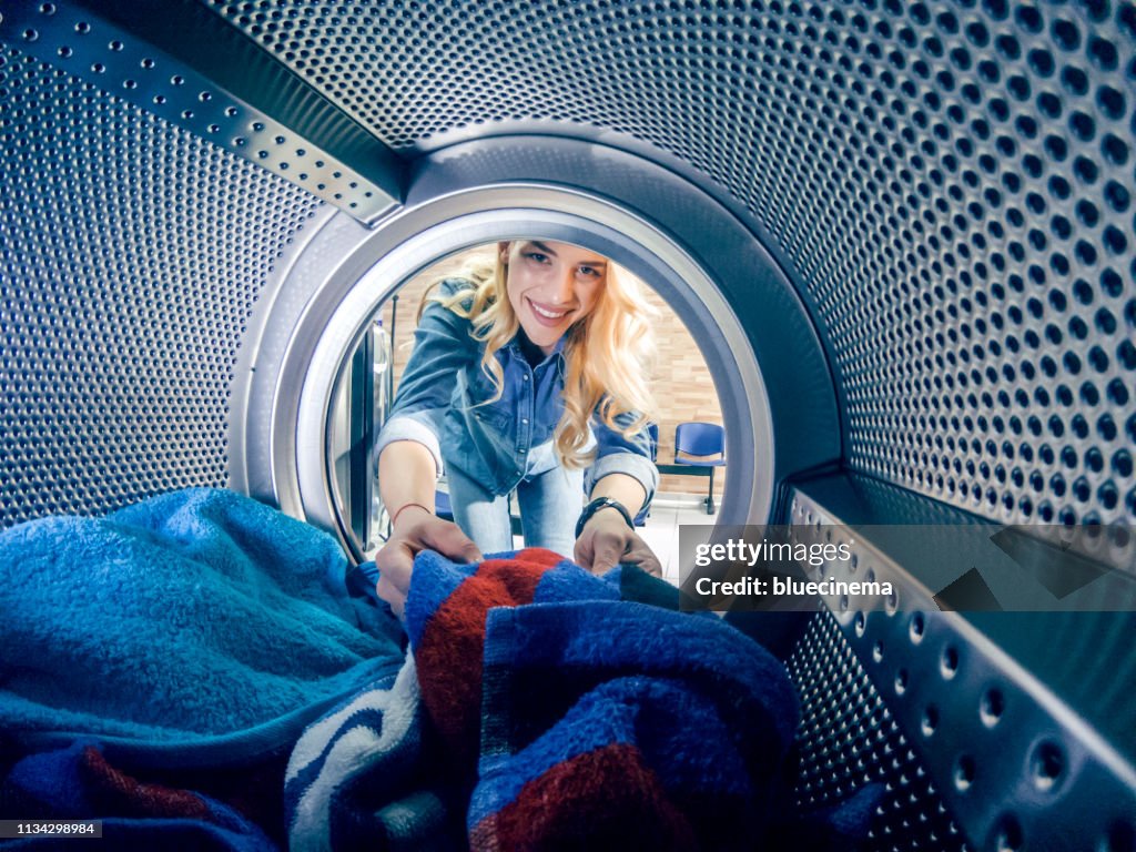 Young woman having a laundry day