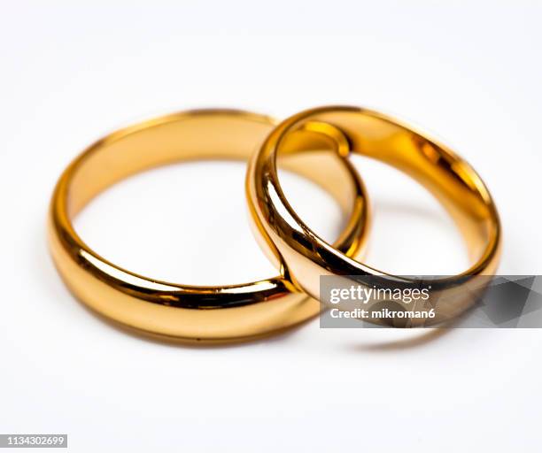 close-up of wedding rings - open round two stock pictures, royalty-free photos & images