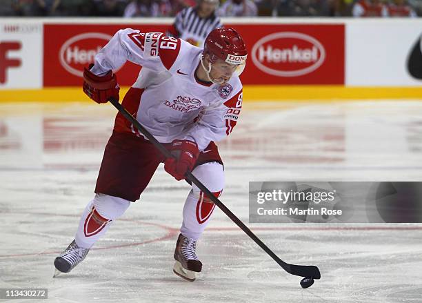 Mikkel Bodker of Denmark skates with the puck during the IIHF World Championship group D match between Czech Republic and Denmark at Orange Arena on...