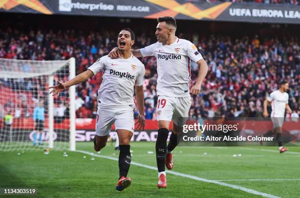 Wissam Ben Yedder of Sevilla FC celebrates with his teammate Munir El Haddadi of Sevilla FC after scoring the opening goal during the UEFA Europa...