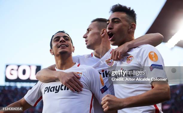 Wissam Ben Yedder of Sevilla FC celebrates with his teammate Munir El Haddadi of Sevilla FC after scoring the opening goal during the UEFA Europa...