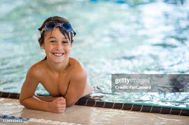 boy at the swimming pool - aquafit stock pictures, royalty-free photos & images