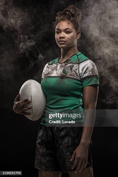 a dirty female rugby player - women rugby stock pictures, royalty-free photos & images