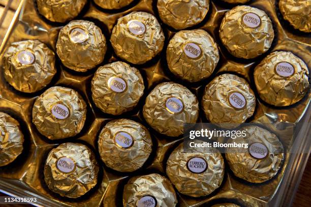 Box of Ferrero SpA Rocher brand hazelnut chocolates are arranged for a photograph in Ottawa, Illinois, U.S., on Monday, April 1, 2019. Kellogg...