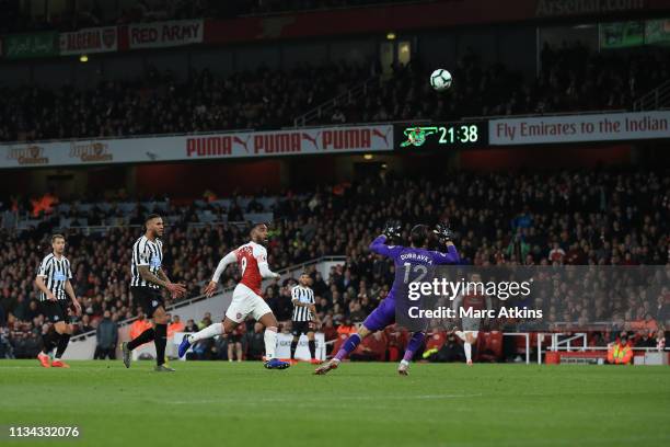 Alexandre Lacazette of Arsenal scores their 2nd goal during the Premier League match between Arsenal FC and Newcastle United at Emirates Stadium on...