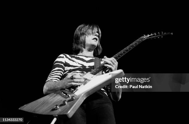 Welsh Rock musician Kim Simmonds, of group Savoy Brown, plays guitar as he performs onstage at the International Amphitheater, Chicago, Illinois, May...