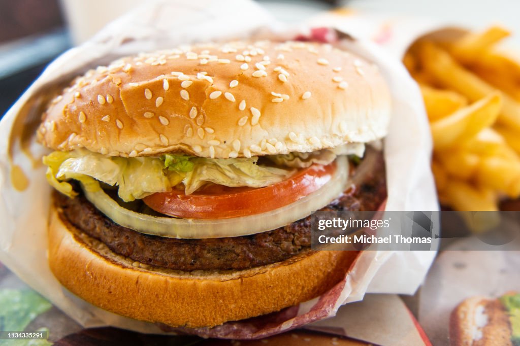 Whopper Table In this photo illustration, an 'Impossible Whopper' sits on a table ...