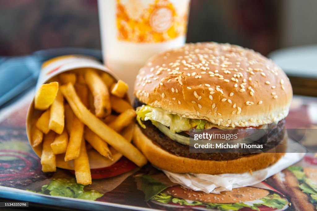 Whopper Table In this photo illustration, an 'Impossible Whopper' sits on a table ...