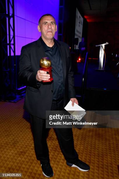 Graham King accepts the CinemaCon International Filmmaker of the Year Award attends CinemaCon 2019 International Day Awards Luncheon at Caesars...