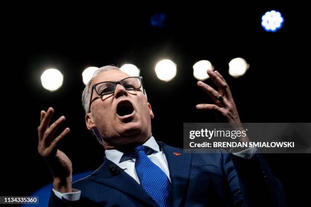 Washington Governor Jay Inslee, a 2020 US Presidential hopeful, speaks during the "We The People" Summit at the Warner Theatre April 1 in Washington,...