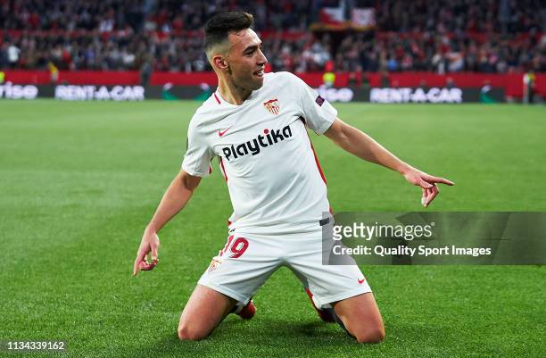 Munir El Haddadi of Sevilla FC celebrates scoring his team's second goal with team mates during the UEFA Europa League Round of 16 First Leg match...