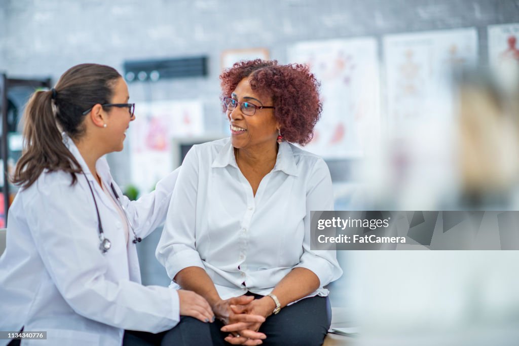 Middle-aged woman visiting the doctor