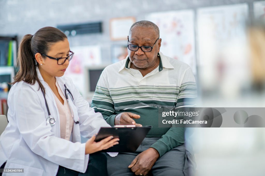 Man consults with his doctor