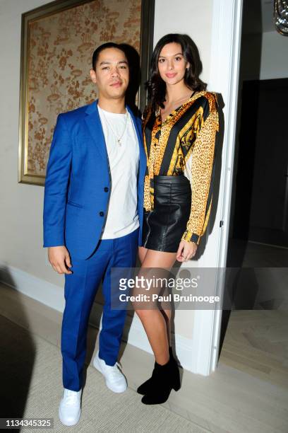 Jeremy L. Carver and Caroline Gill attend The Cinema Society With Synchrony Bank And FIJI Water Host The After Party For Marvel Studios' "Captain...
