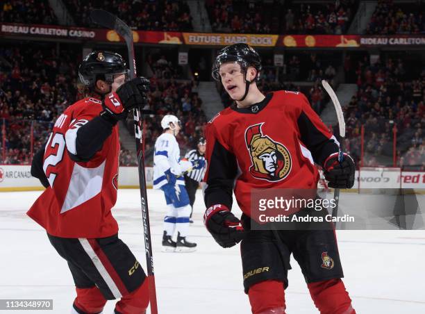 Brady Tkachuk of the Ottawa Senators celebrates with Thomas Chabot after scoring a first period goal on the Tampa Bay Lightning at Canadian Tire...