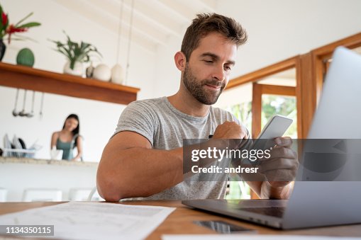 Multitask Men Business Man At Home Multitasking Using Mutiple Devices High-Res Stock ...
