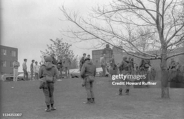 View of Kent State University students face off against a line Ohio National Guardsmen in the wake of the National Guard's shooting of protesters on...