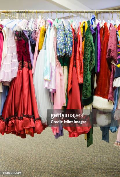 costumes on a rack - concurso de beleza imagens e fotografias de stock