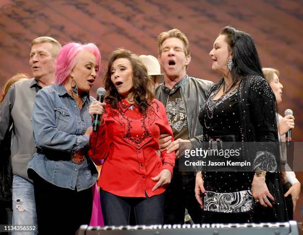 Tanya Tucker, Loretta Lynn, Dennis Quaid and Crystal Gayle perform onstage for Loretta Lynn: An All-Star Birthday Celebration Concert at Bridgestone...