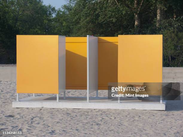beach dressing rooms - on the beach backstage stock pictures, royalty-free photos & images