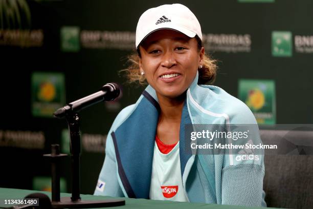 Naomi Osaka of Japan fields questions from the media at a press conference during the BNP Paribas Open at the Indian Wells Tennis Garden on March 07,...