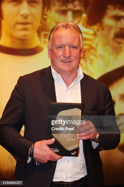 Andreas Brehme poses on stage during the Hall Of Fame gala at Deutsches Fussballmuseum on April 01, 2019 in Dortmund, Germany.