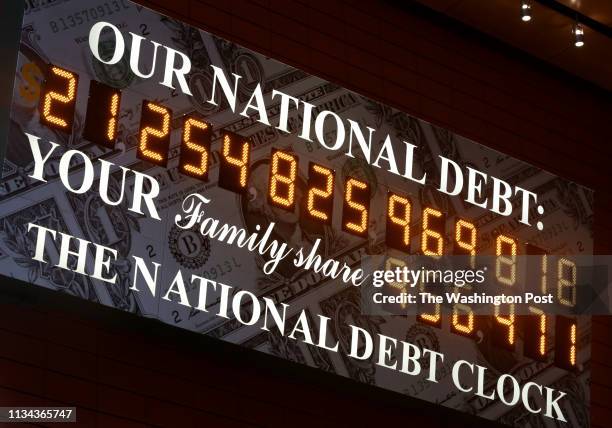 The National Debt Clock in Manhattan, NY, created by Seymour Durst, seen outside of the Bank of America Tower on September 20, 2018. His son, Douglas...