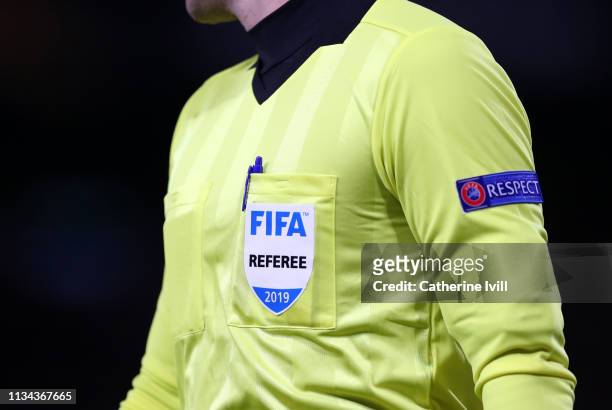 Detailed view of the FIFA referee badge during the UEFA Europa League Round of 16 First Leg match between Chelsea and Dynamo Kyiv at Stamford Bridge...
