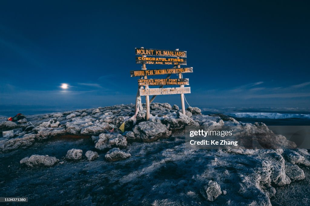 Top of Mt Kilimanjaro with a Full Moon at Sunrise