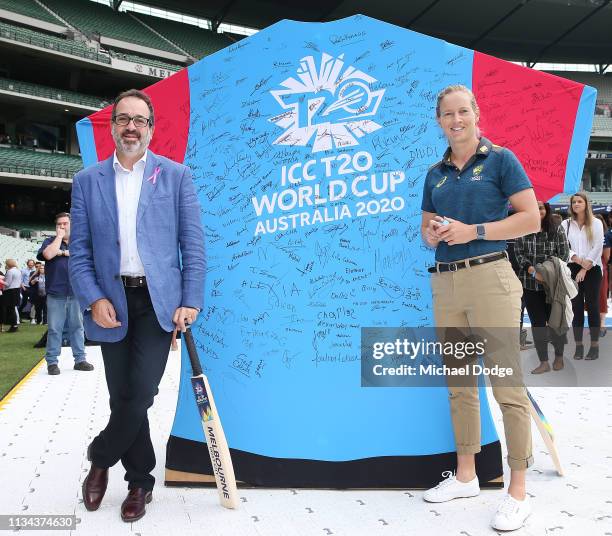 Sports Minister Martin Pakula poses with Australia women's captain Meg Lanning in front a giant ICC T20 World Cup 2020 shirt that achieved a world...