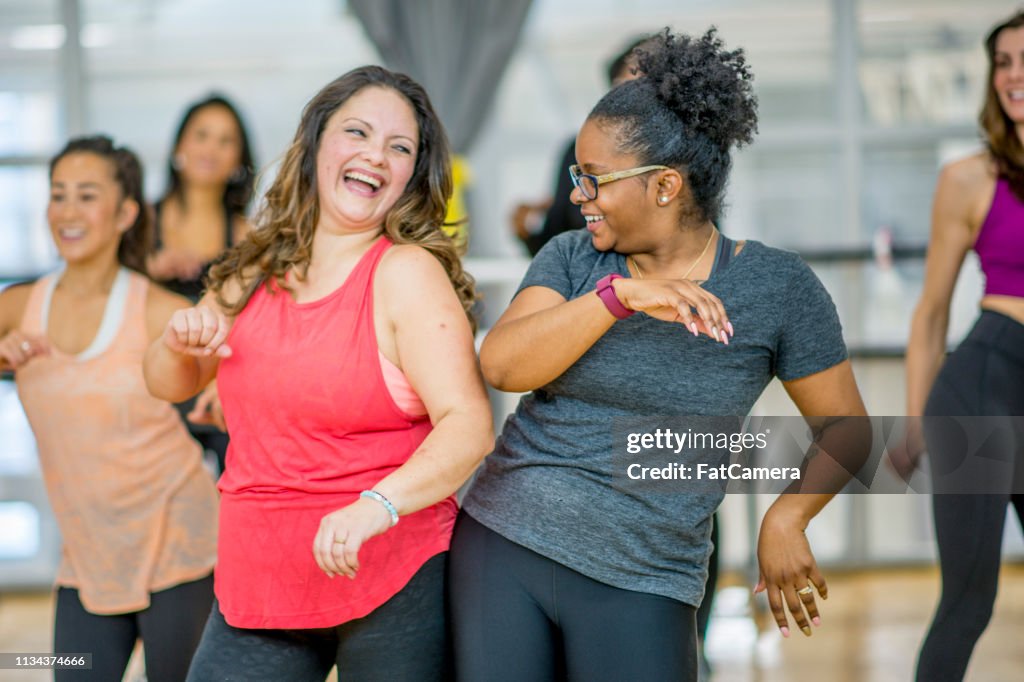 Women Dancing Together