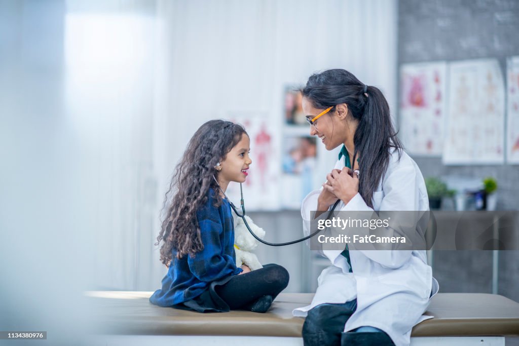 Using The Stethoscope Using A Stethoscope High-Res Stock Photo - Getty Images