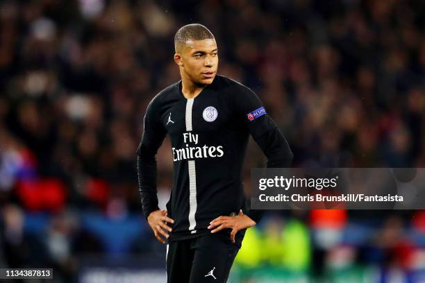 Kylian Mbappe of Paris Saint-Germain looks on during the UEFA Champions League Round of 16 Second Leg match between Paris Saint-Germain and...