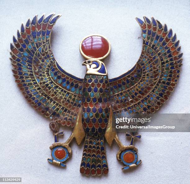 Pectoral jewel from treasure of Tutankhamun showing falcon headed god with sun disk