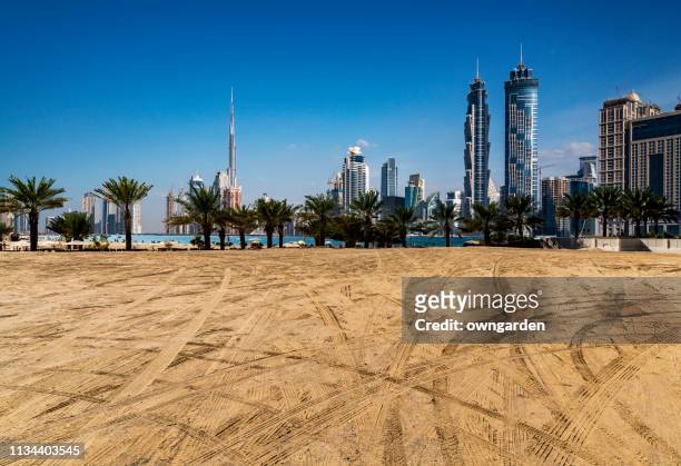 looking along beach towards the business district,dubai,uae - expo 2020 dubai stock pictures, royalty-free photos & images