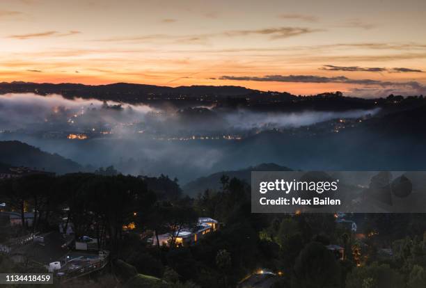 high angle view of mulholland drive at dusk, los angeles, usa - mulholland drive stockfoto's en -beelden