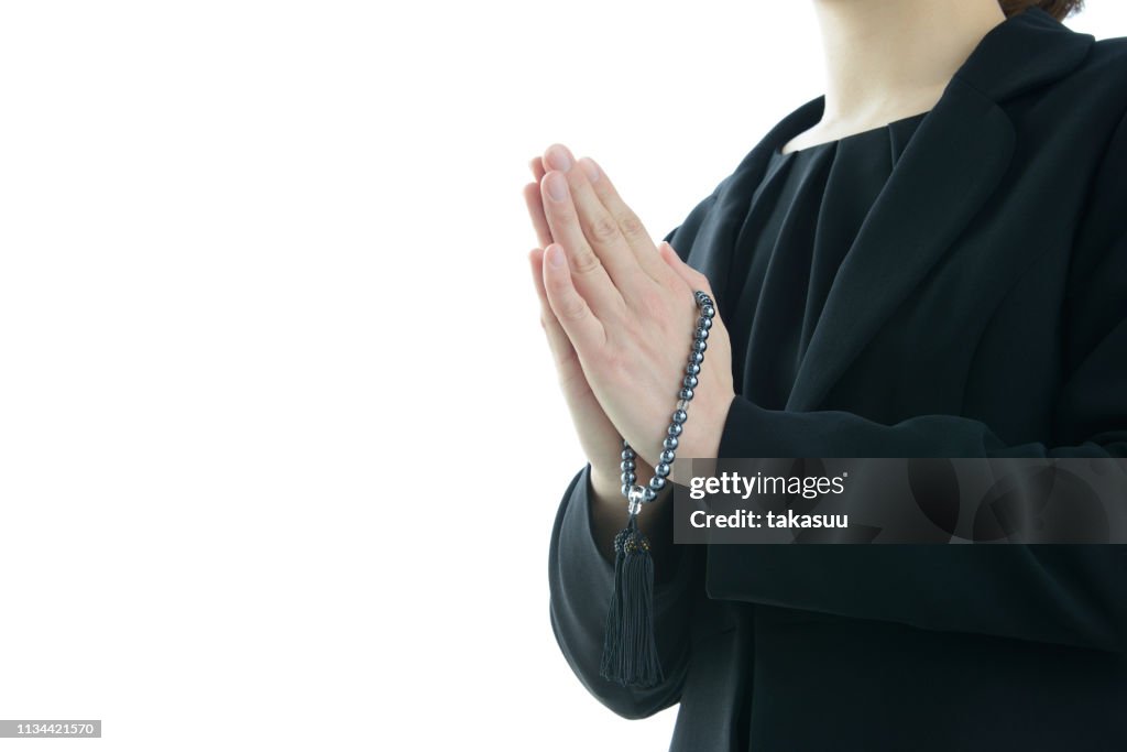 Japanese praying style in funeral