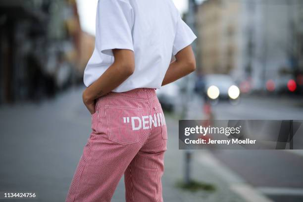 Anuthida Ploypetch wearing an Acne Studios shirt, Off White jeans on March 07, 2019 in Berlin, Germany.